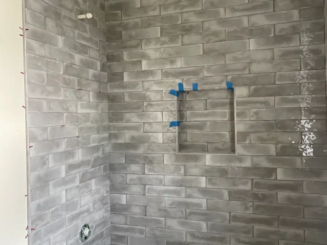 Gray tile bathroom shower installation near Beaverton, OR