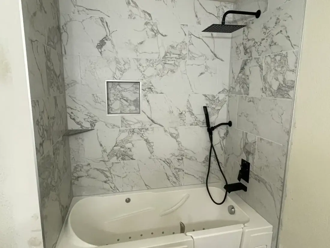 Marble tile bathroom with walk-in tub installation Oregon